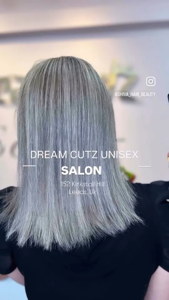 A full head of silver balayage, glossy and straight