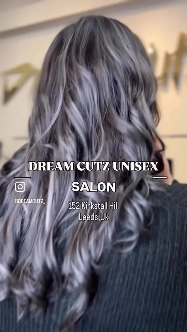 Long silver-grey hair with a soft wave