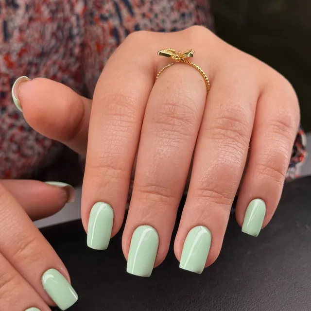 Mint-green and nude gel nails