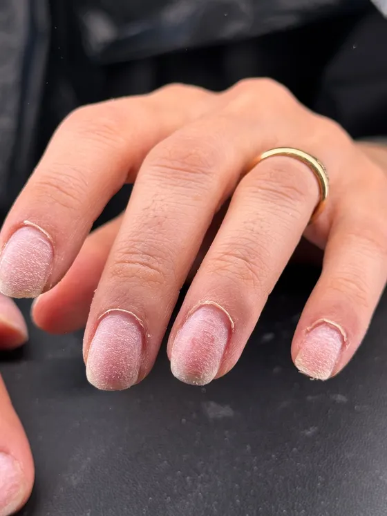 Nude and glitter ombré almond nails