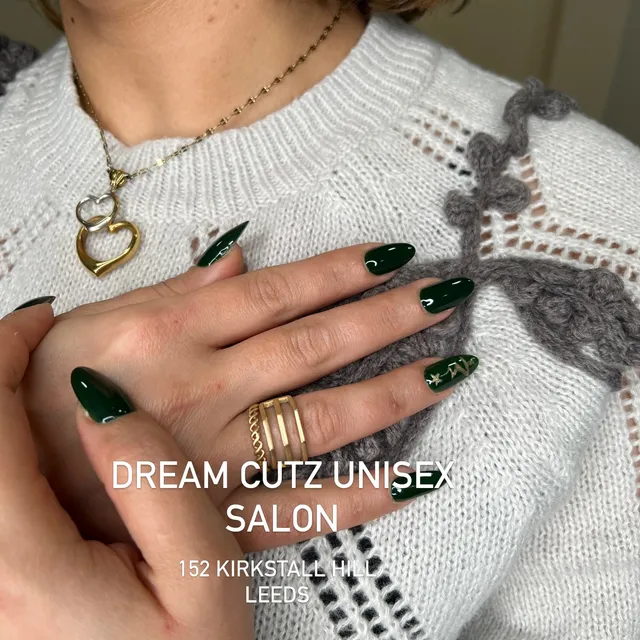 Green-and-nude nails with gold detailing