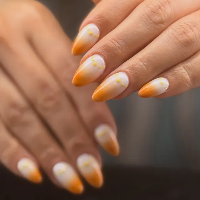 Amber ombré nails with hand-painted detail
