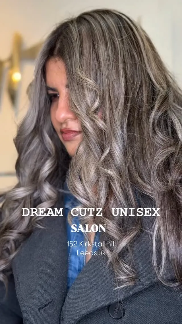 Voluminous ash-silver curls, coloured and styled