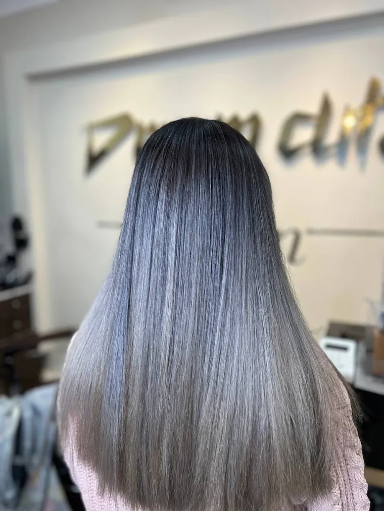 Long silver ombré hair coloured at Dream Cutz