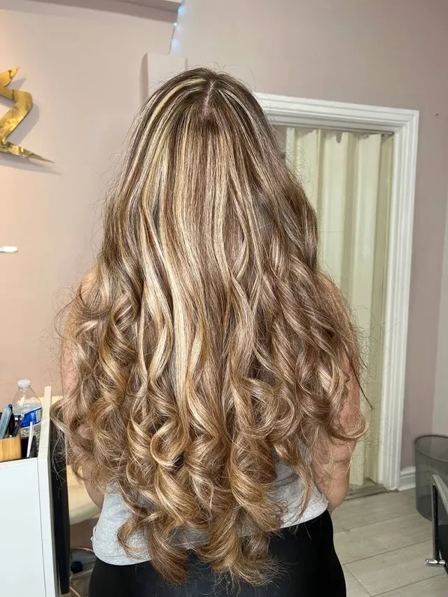 A full head of soft blonde highlights